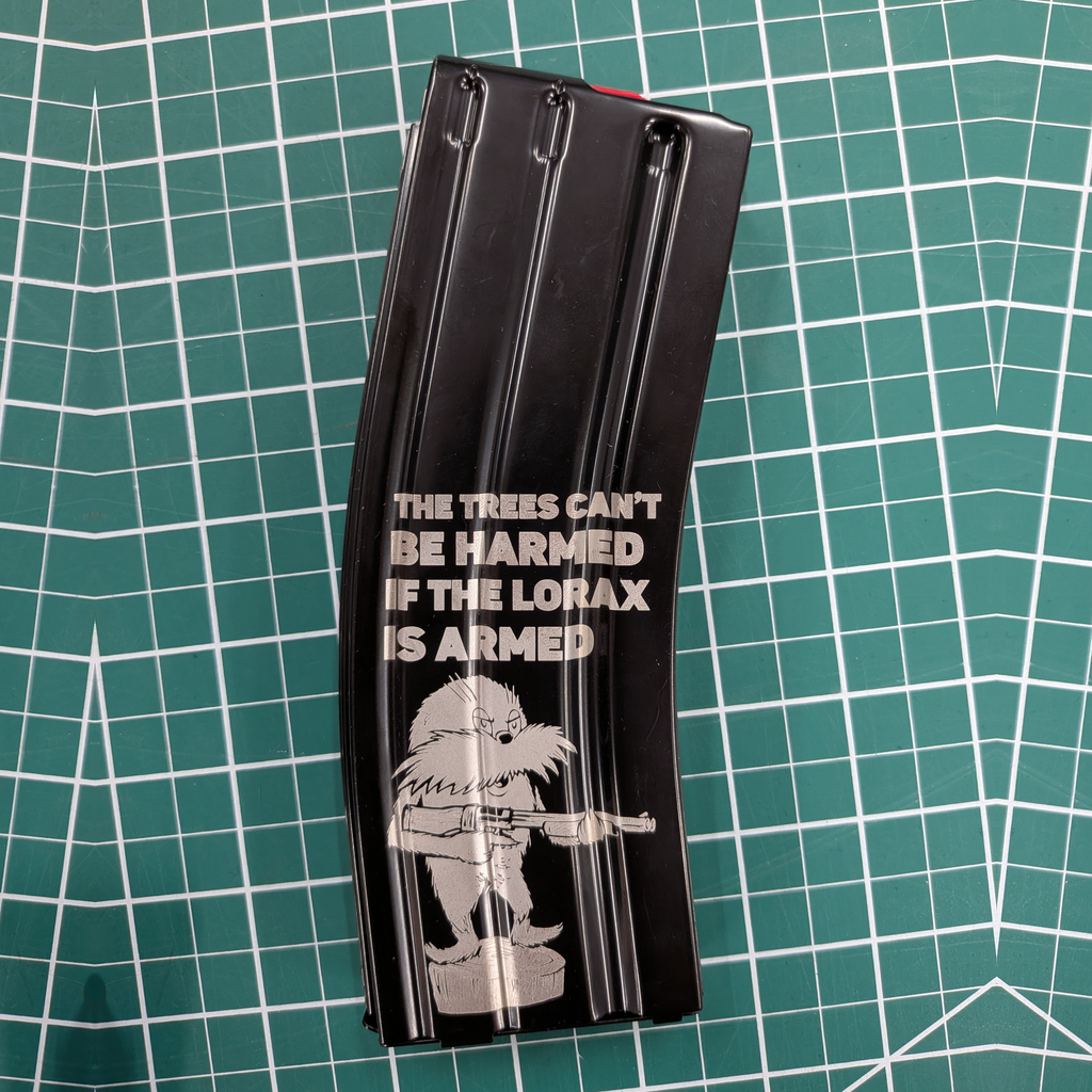 The Trees Cant Be Harmed If The Lorax Is Armed - Laser Engraved Mag