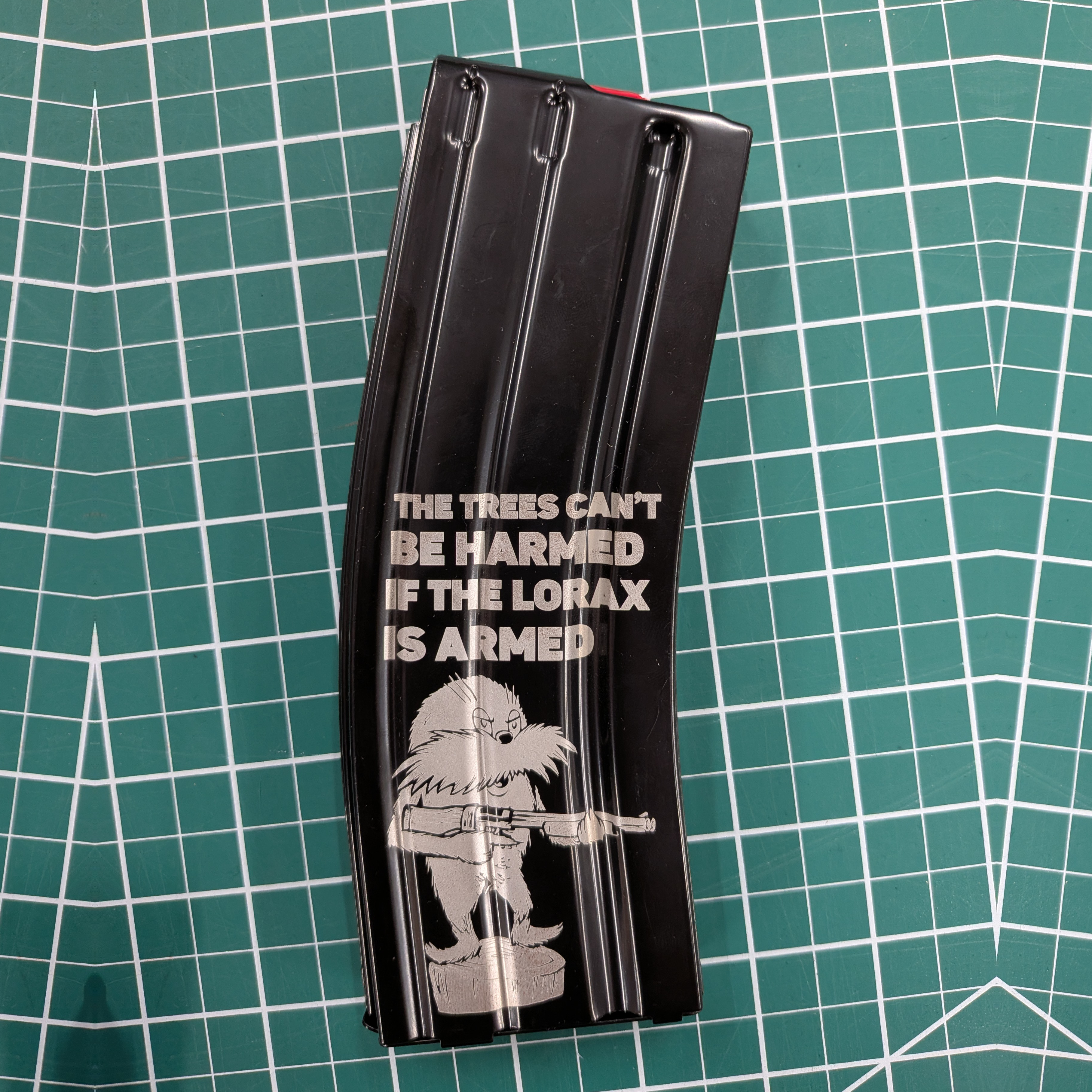 The Trees Cant Be Harmed If The Lorax Is Armed - Laser Engraved Mag