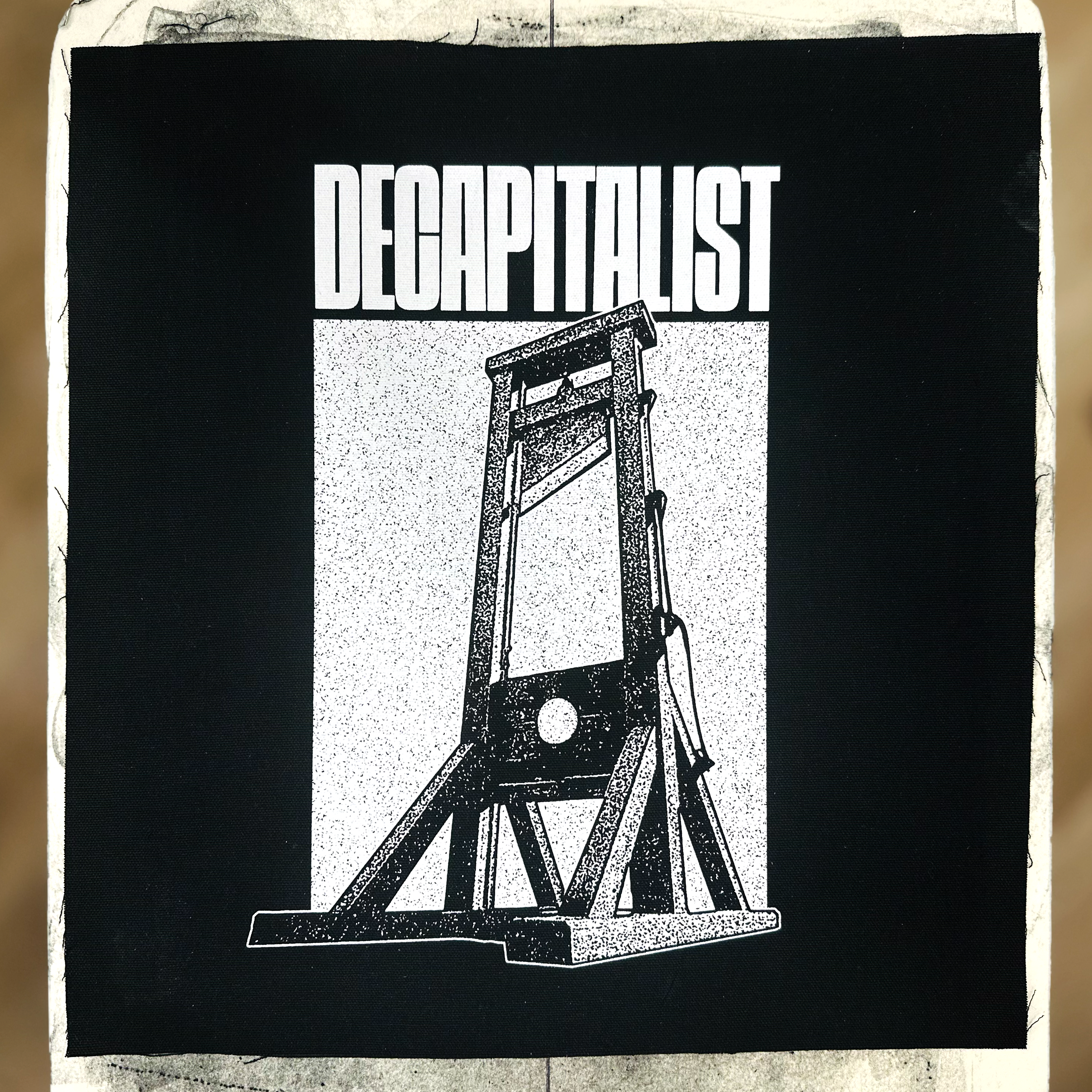 Decapitalist - Backpatch