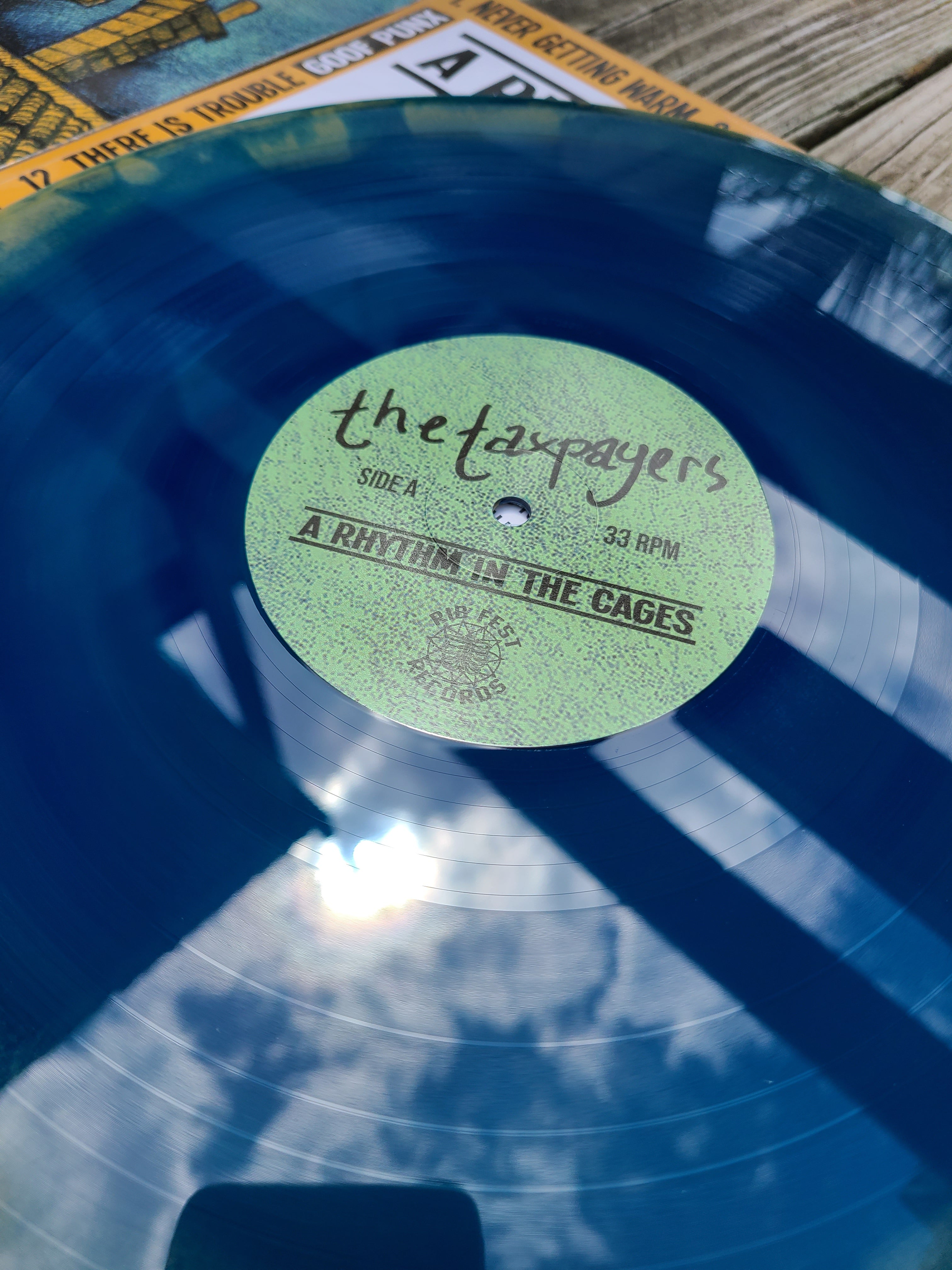 The Taxpayers - A a Rhythm In The Cages - Vinyl Physical Media