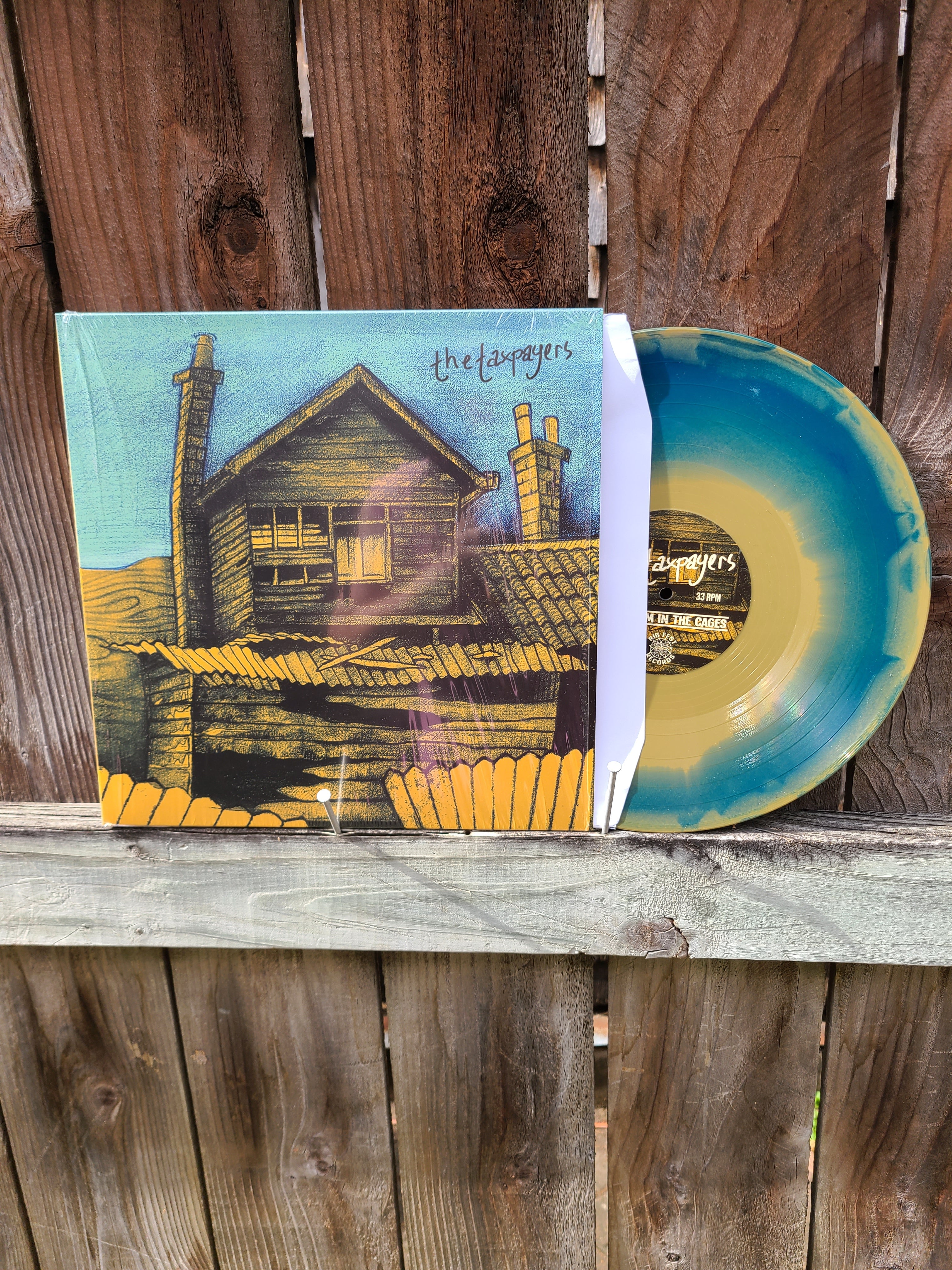 The Taxpayers - A a Rhythm In The Cages - Vinyl Physical Media